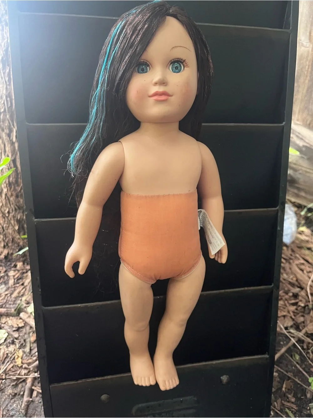 Brown-Haired Play Doll in Light Green Top and Lavender Pants